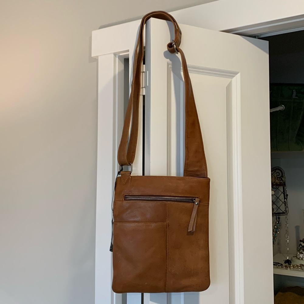 Beautiful leather, cross body Latico bag in caramel color